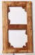 Wooden stretched canvas frame on a white backdrop with a center support and triangular corner supports showing from behind. The frame's wooden surface shows both age and peeling tape.