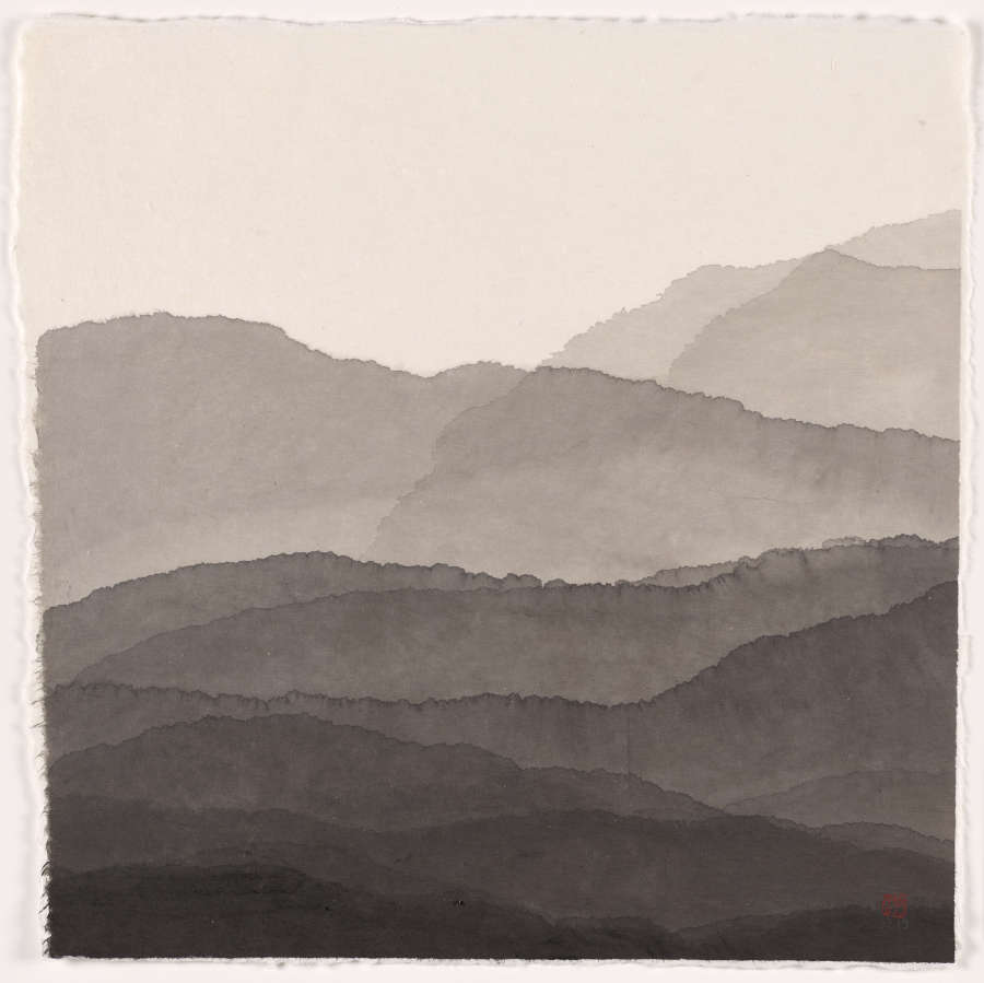 Ink drawing of rounded mountain-like shapes consisting of overlapping, organically shaped washes of ink, with the base of the mountains being darker.