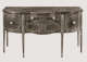 A refined wooden storage table with oval inlays and ornamental handles, supported by slender legs.