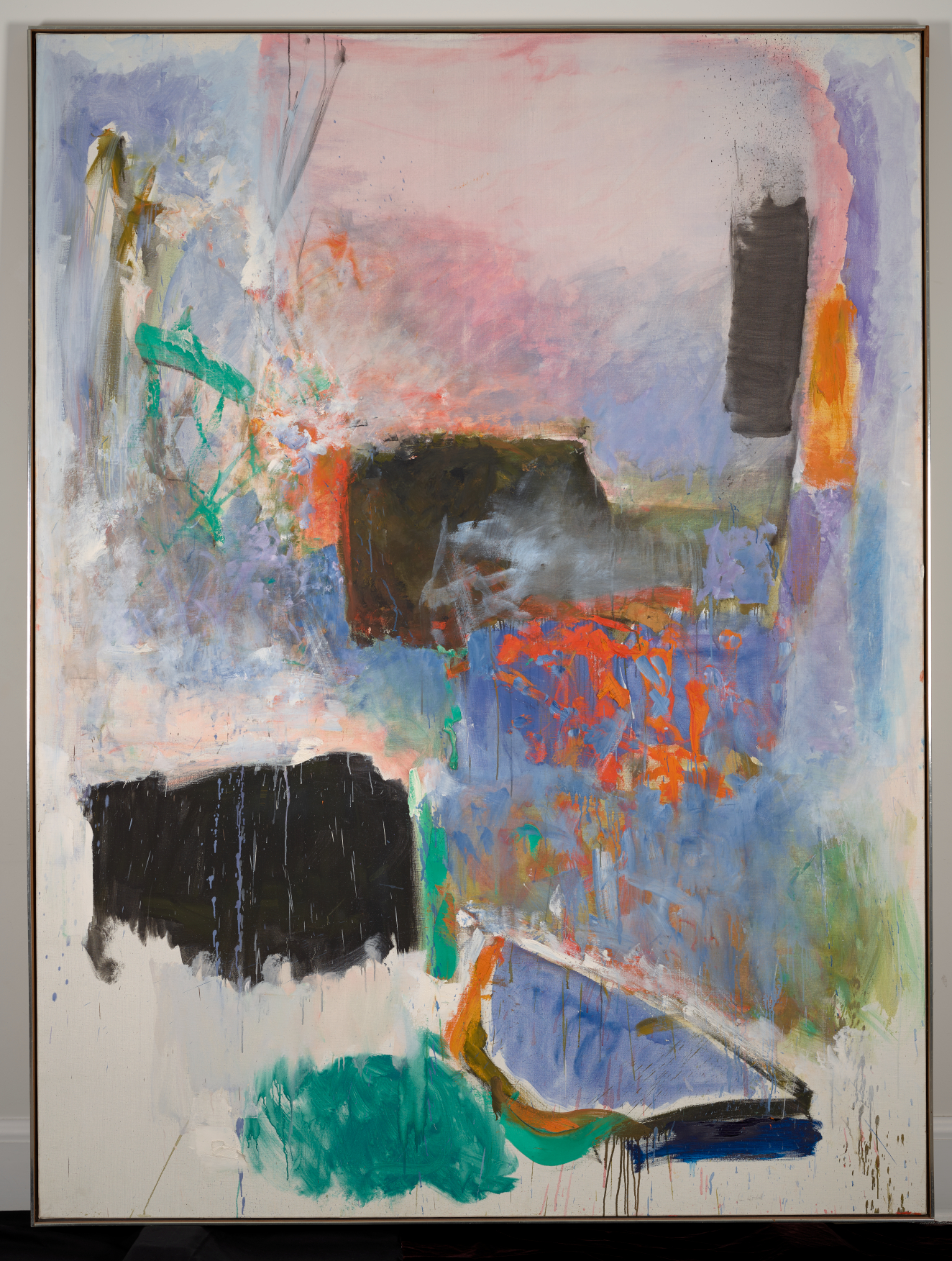  Abstract painting of textured swathes of dark purple, orange and green paint harshly placed against and blending into a light pink and blue washy background.
