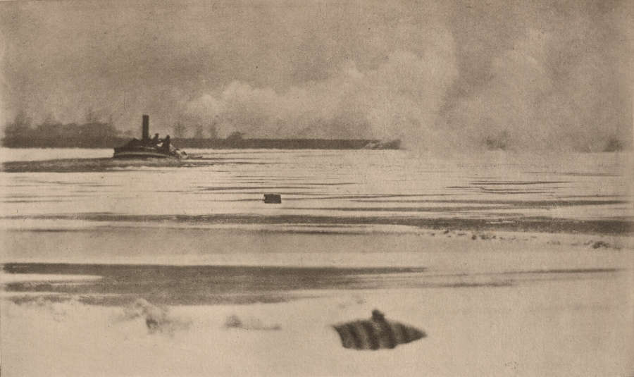 A black and white image depicting open water with a steamboat in the distance, surrounded by smoke and gentle ripples on the surface.