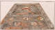 Illustration of a mosaic floor featuring geometric patterns and circular portraits in a rusty brown and black. 