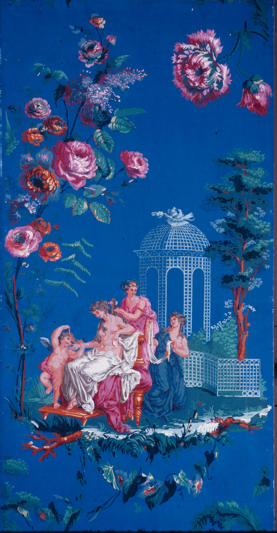 Segment of wallpaper featuring a vibrant,idyllic scene of individuals wearing flowing garments in a lush garden with a trellis. Floral motifs surround the scene set against a blue backdrop.