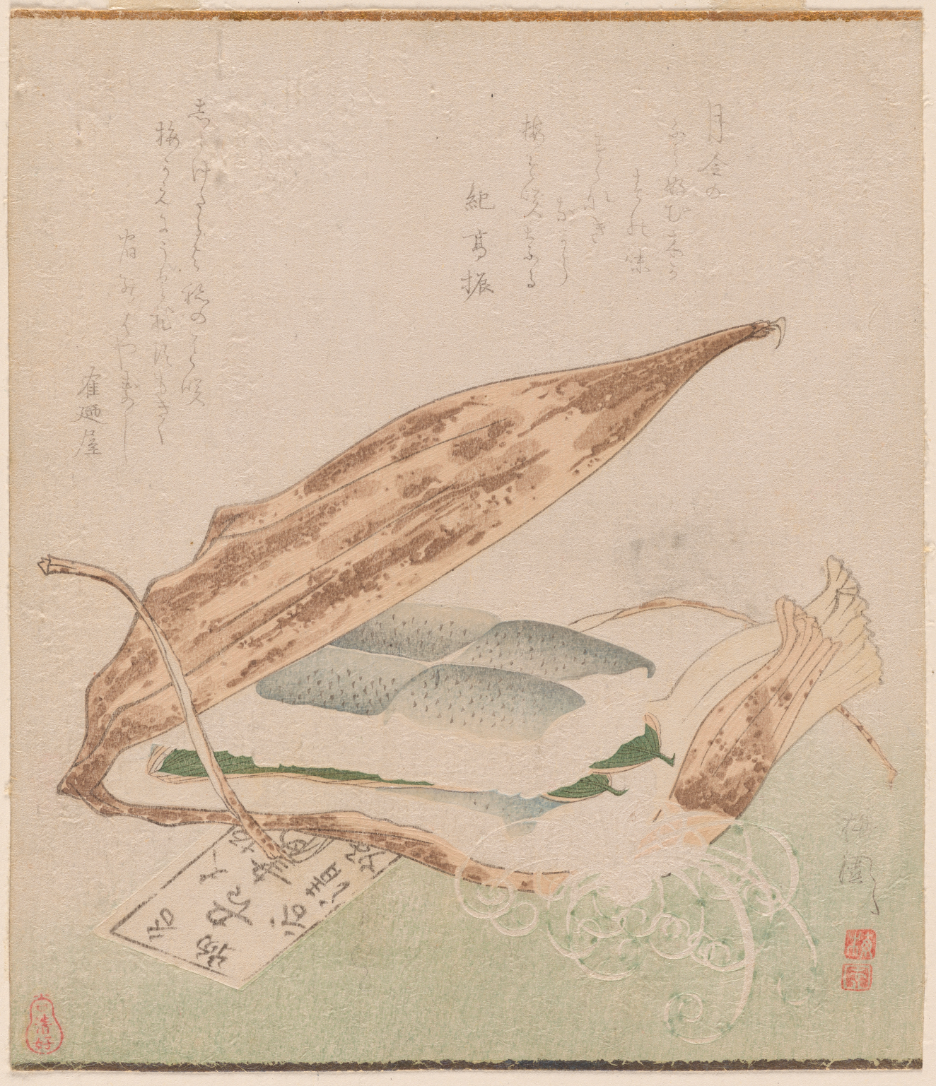 Rectangular sushi pieces inside a folded leaf, below columns of calligraphic script.