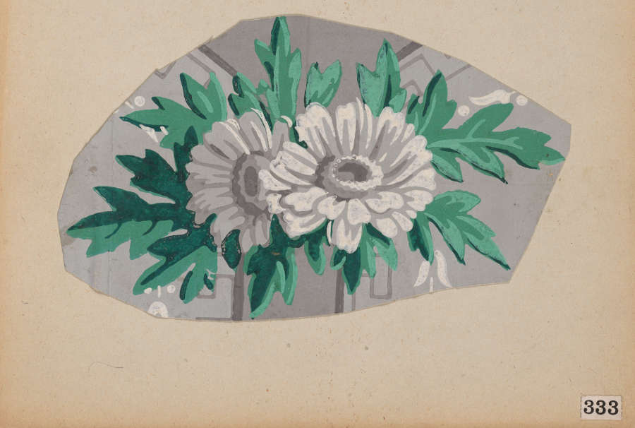 Two white flowers at center with detailed green foliage on a muted gray background.