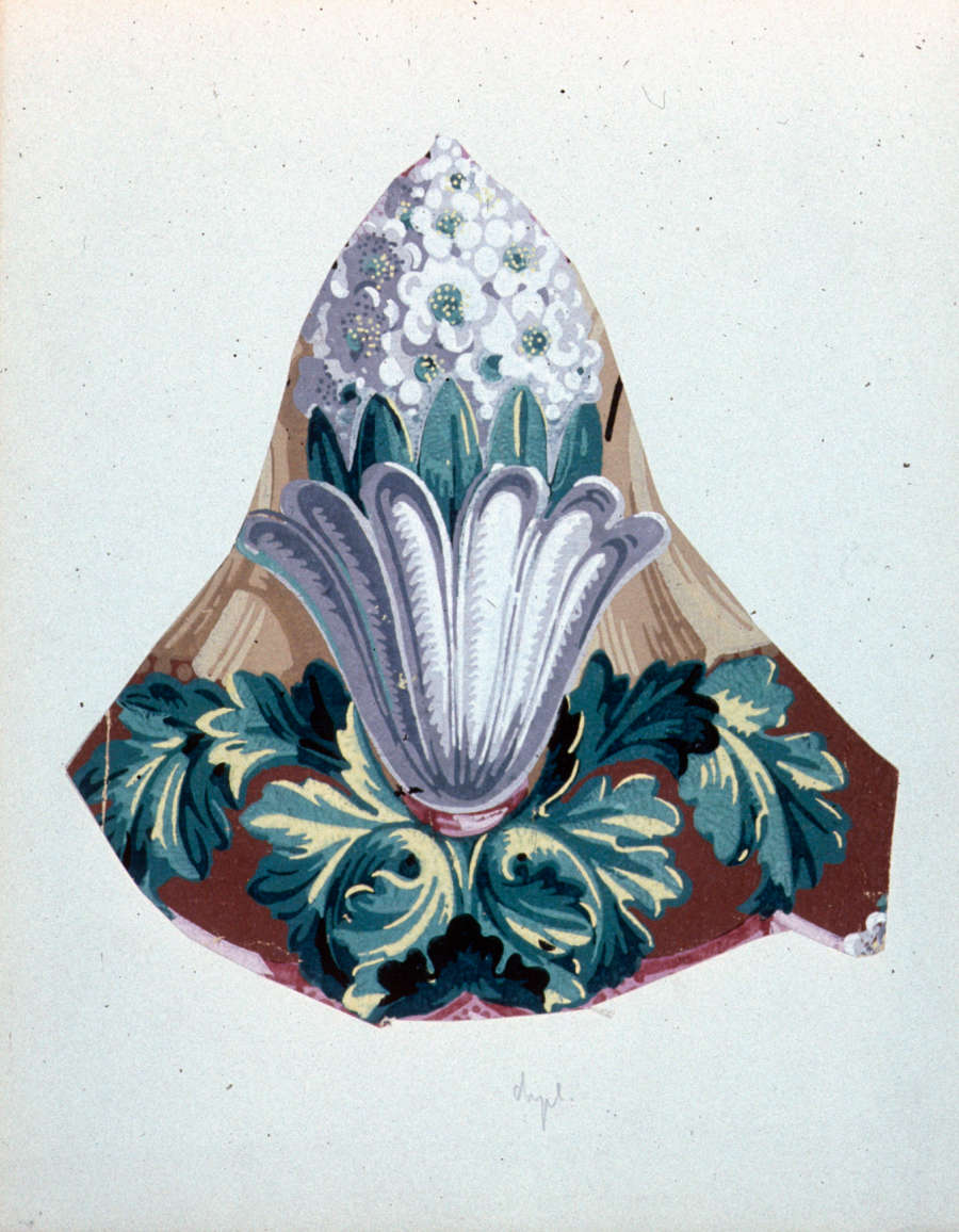 Decorative motif depicting a cone of silver flowers with green leaves and accents emerging from a silver curved vase flanked by symmetrical green foliage on a gold and brown backdrop.