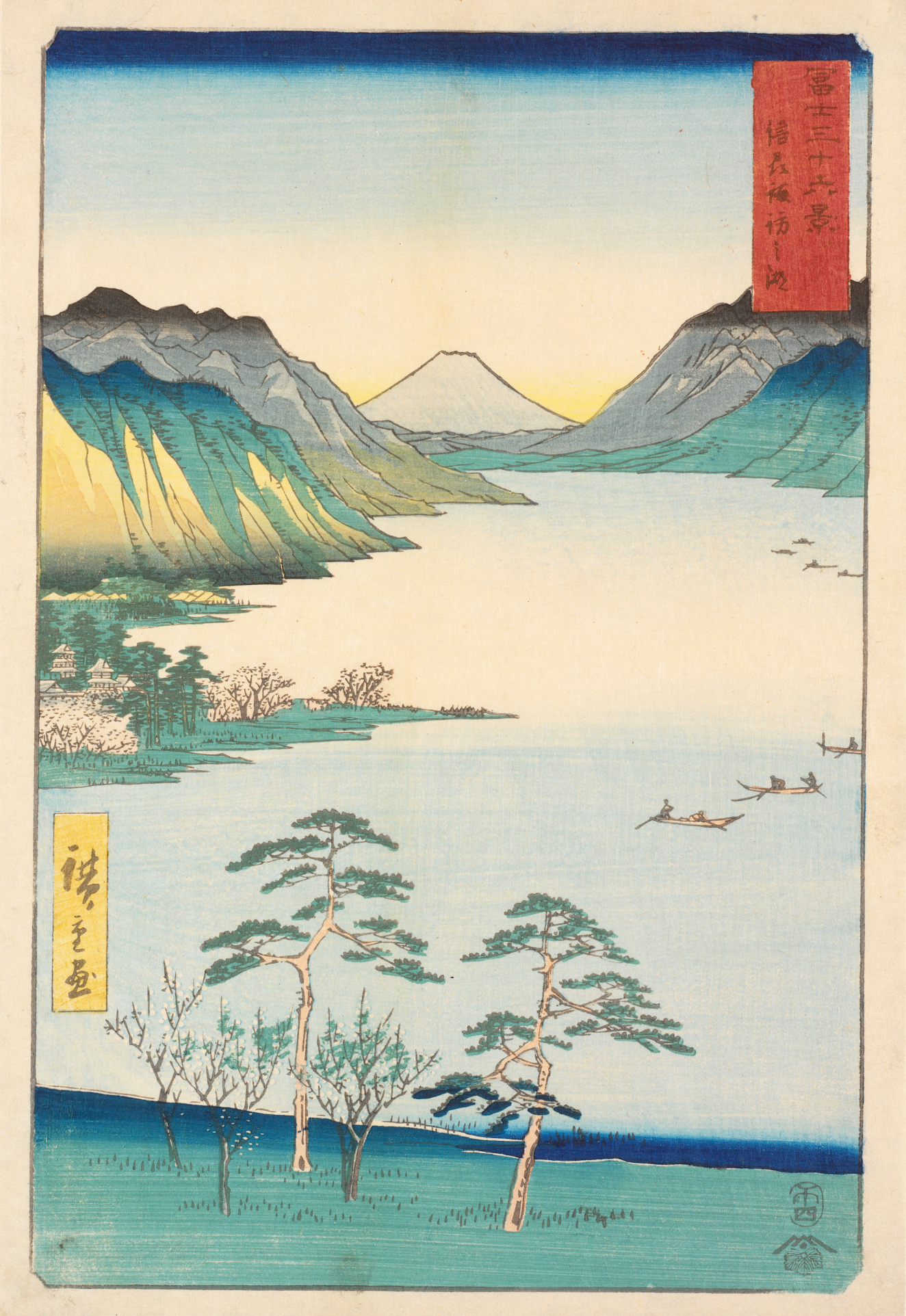 A serene lake with small boats surrounded by green mountains with trees in the foreground and a tranquil blue and yellow horizon.