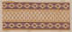 Horizontal decorative strip with a central yellow pattern of white triangular shapes bordered by purple stripes with a pattern of yellow diamonds with white borders and dark purple accents.
