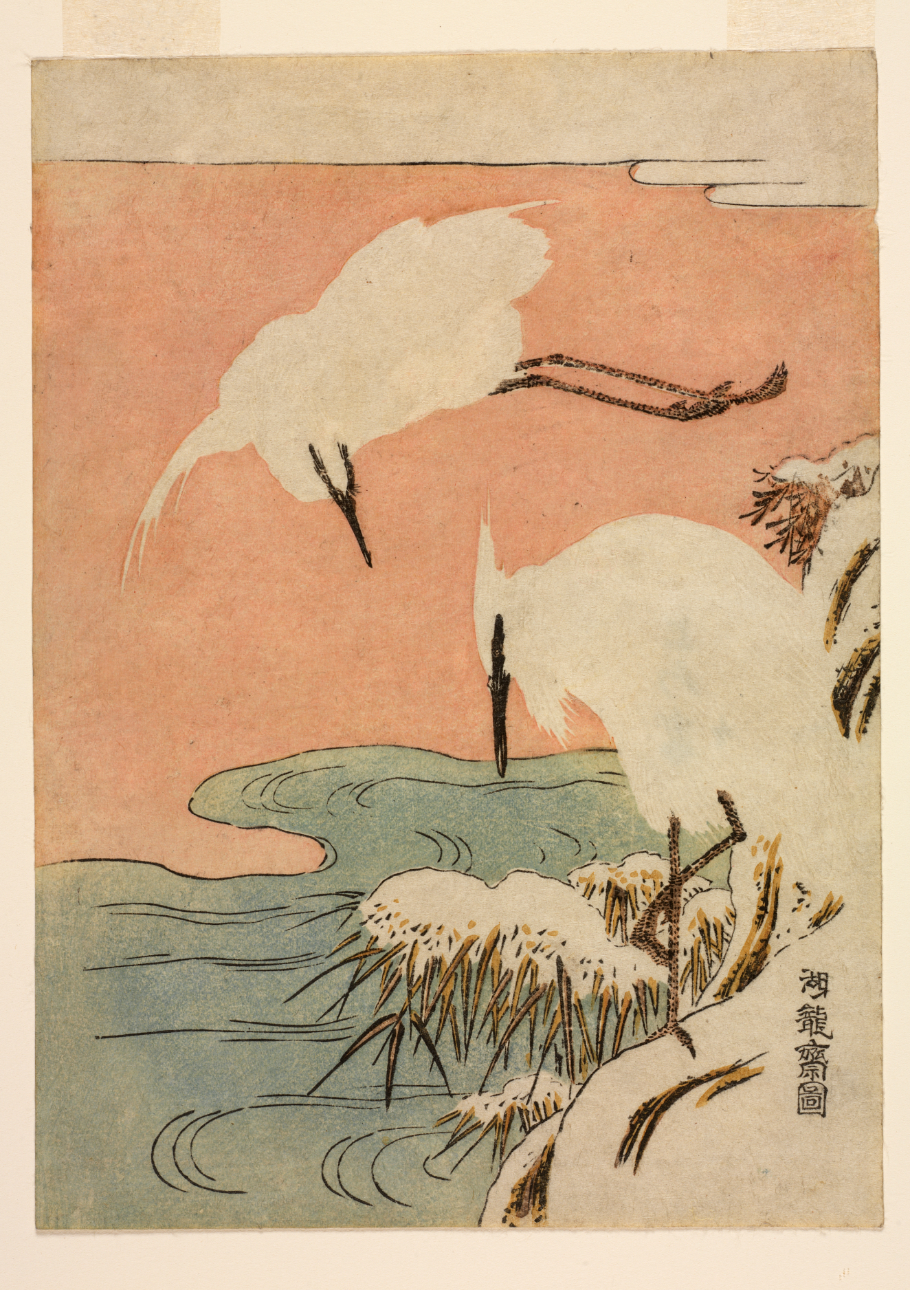 A pair of white herons, one in the sky and the other standing by a winding riverbank lined with snow-covered reeds against a warm pink background.