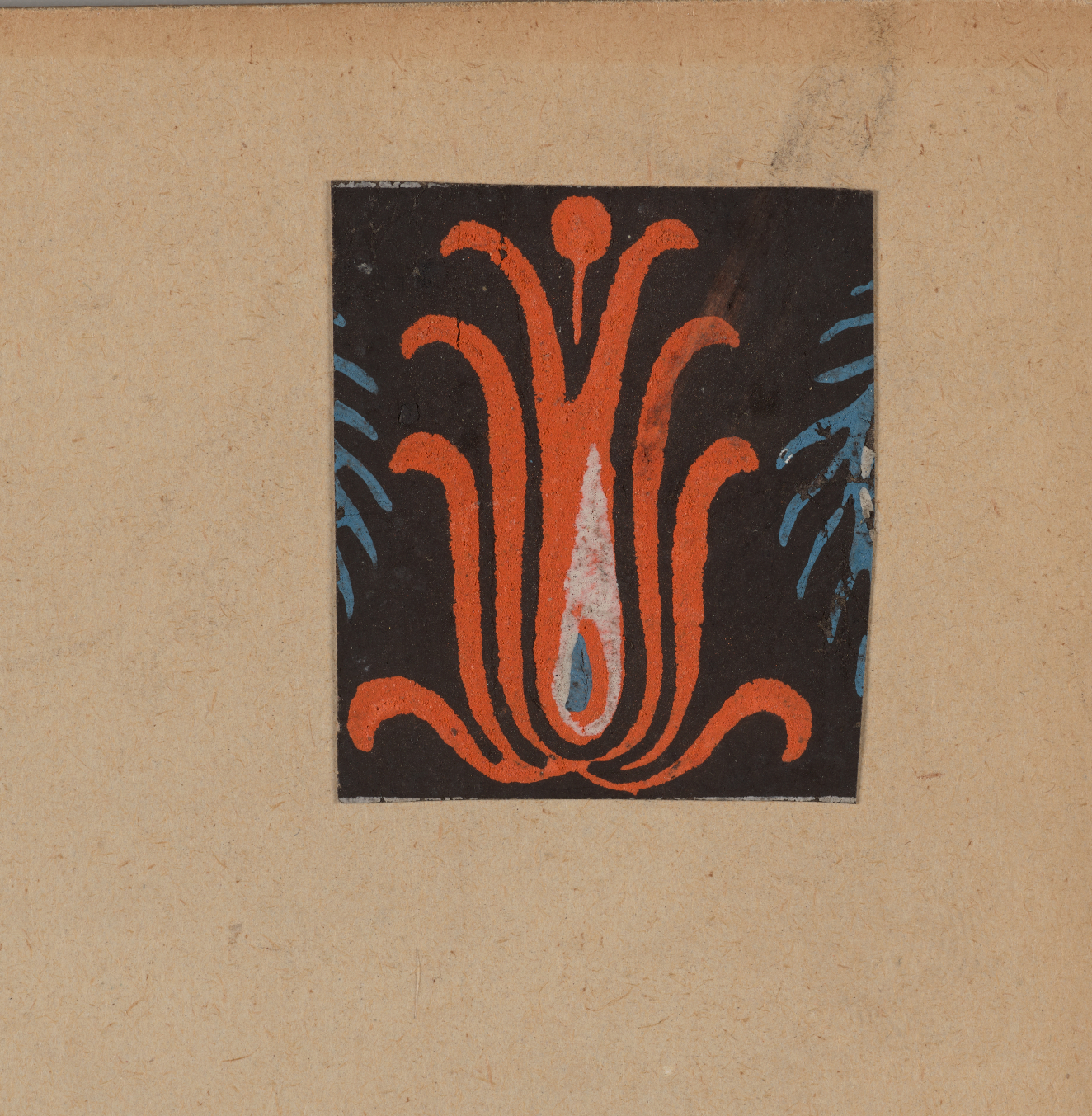 Small square ornament in black on a neutral backdrop featuring a central orange flower with curving petals, a white center, and subtle blue accents.