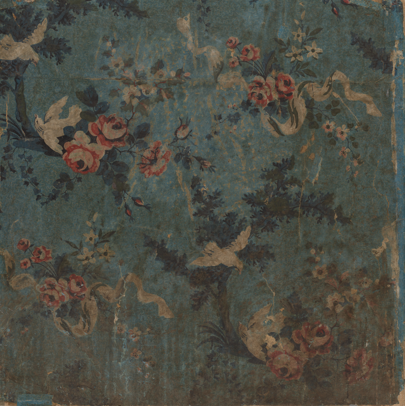 Weathered, blue wallpaper with repeating motifs of white doves next to white ribboned  pink and white flower bouquets and in blotchy textured black trees.