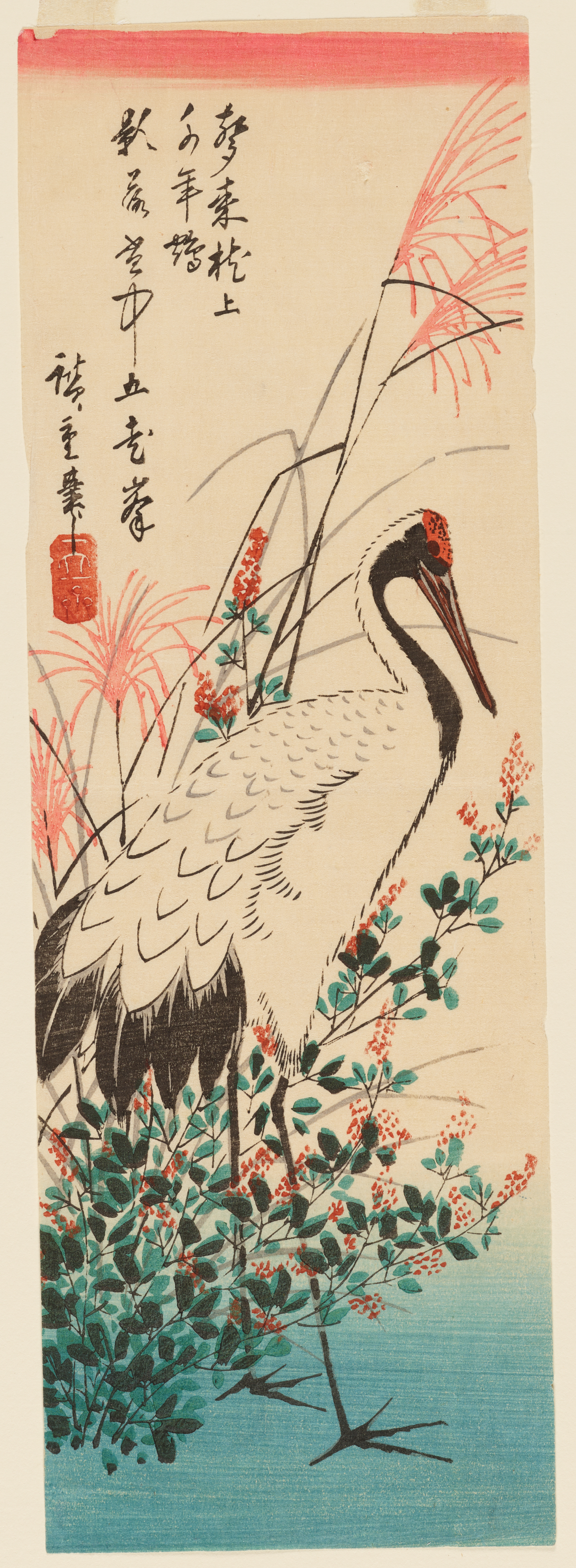A white crane with black feathers, and a red crown gazing downward amid tall grass stalks and leafy foliage with pink flowers. Calligraphy floats above to the right.