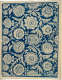 Vintage repetitive wallpaper sample depicting a dense, ornate, blue and cream pattern showcasing paisleys and intricate stylized floral motifs on a rich tan-toned base.