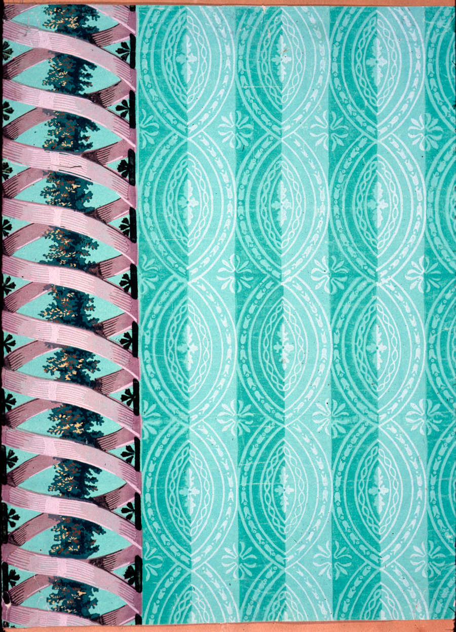 Striped light and dark turquoise wallpaper with white geometric patterning overtop. The left side contains a pink ribbon wrapping around a leaf garland and two brown embellished vertical lines.