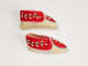 Pair of moccasins with a bright red body featuring embroidery of white flowers attached to green stems. The soles of the moccasins are a light tan.