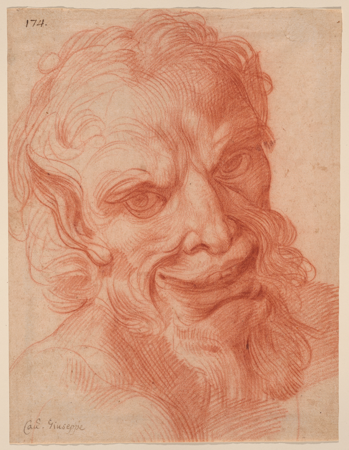 Red chalk drawing of a smiling satyr’s head with delicate marks throughout and vigorous crosshatching at the chest. He has pointed ears and curly hair and beard.