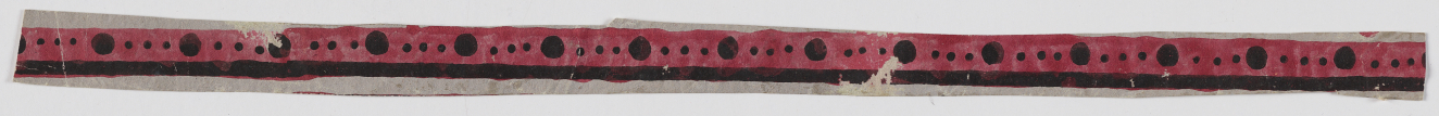 Thin horizontal strip in red on a white background featuring a repeating pattern of black circles connected by smaller dots bordered by a black stripe.