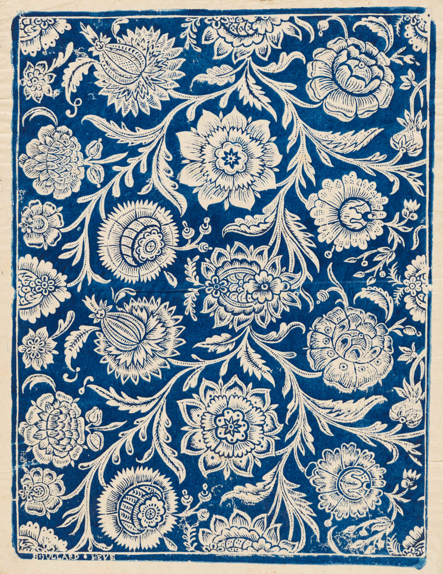 Vintage repetitive wallpaper sample depicting a dense, ornate, blue and cream pattern showcasing paisleys and intricate stylized floral motifs on a rich tan-toned base.