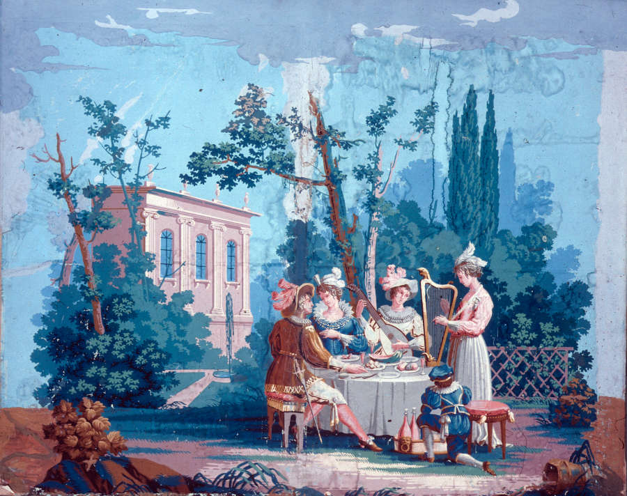 Segment of wallpaper depicting a vibrant scene with four elegantly dressed women gathered around a table, and a person kneeling besides. The scene is set in an idyllic garden.