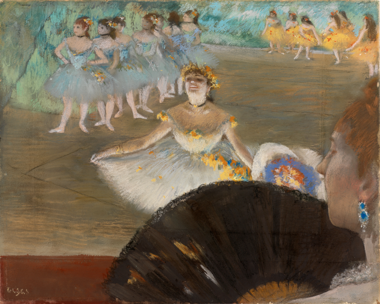 A ballerina in a white tutu adorned with yellow flowers, gracefully curtsies before a seated audience member. Other dancers in blue and yellow fill the background, moving across the stage. 