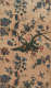 Panel of elegant vintage wallpaper featuring a richly colored central arrangement of exotic birds and flowers interspersed with smaller floral clusters on a faded canvas
