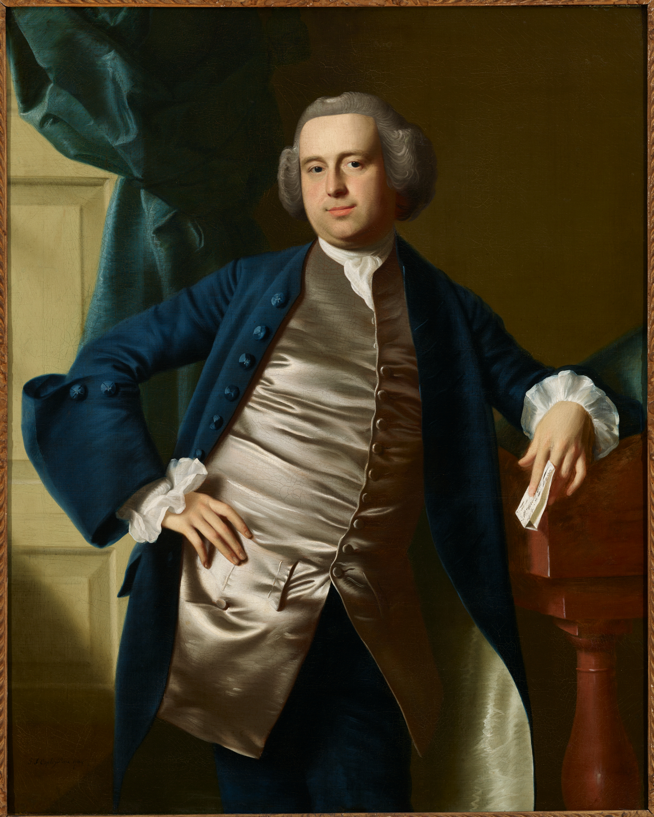 A formal portrait of a man dressed in 18th-century attire, wearing a blue coat, shiny waistcoat, and powdered hair with his right hand on his hip.