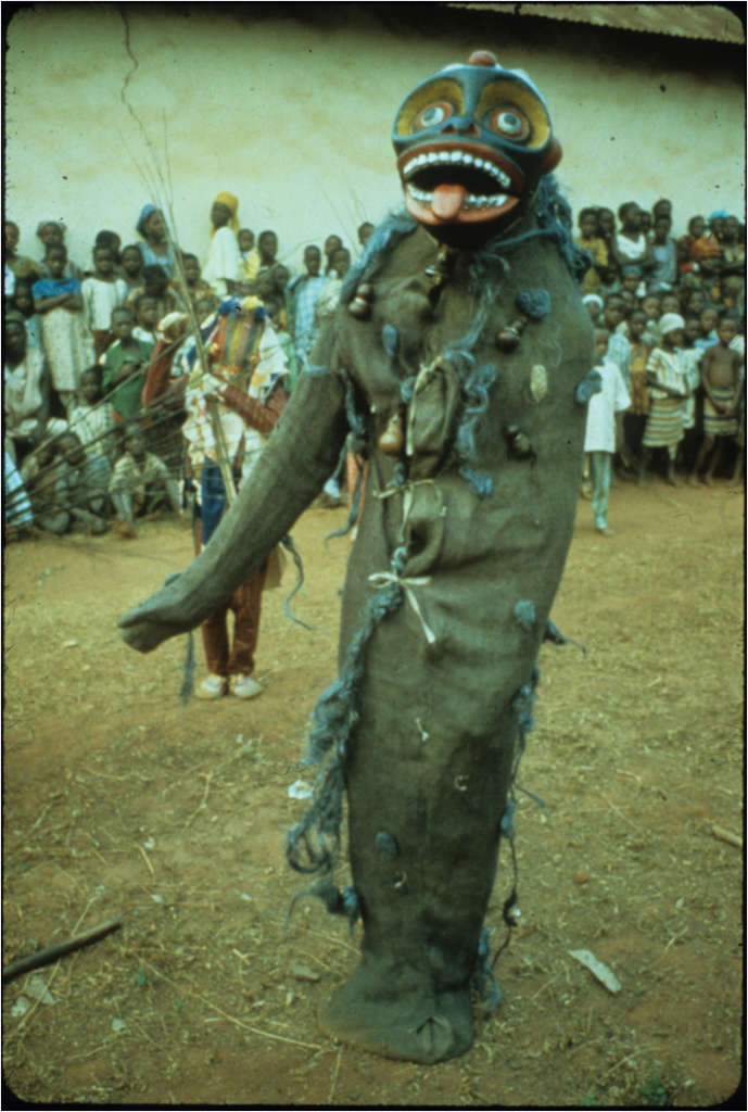 Àrònì, known for his trickster nature and knowledge of healing herbal substances, is a one-armed, one-legged forest spirit, 1978.