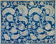 Repetitive wallpaper sample depicting a dense, ornate, bright blue and white pattern showcasing paisleys and intricate stylized floral motifs on a white base.