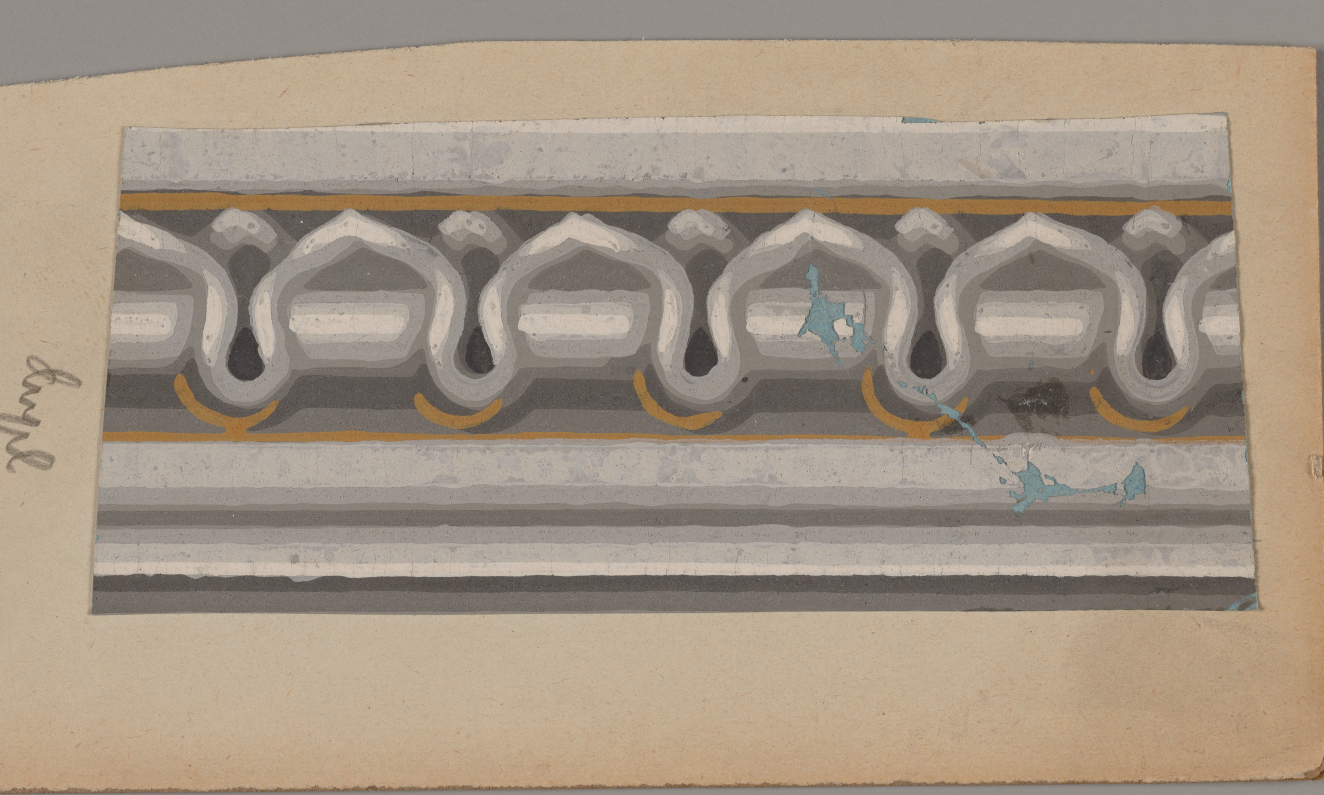 Horizontal rectangular pattern on a tan backdrop featuring intricately gray shaded repeating arches with gold accents bordered by light gray stripes. Atop is a paint splatter to the center right.