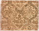 Segment of vintage wallpaper depicting a rustic pattern of brown florals and intricate swirl motifs on a richly tan-toned, textured background.
